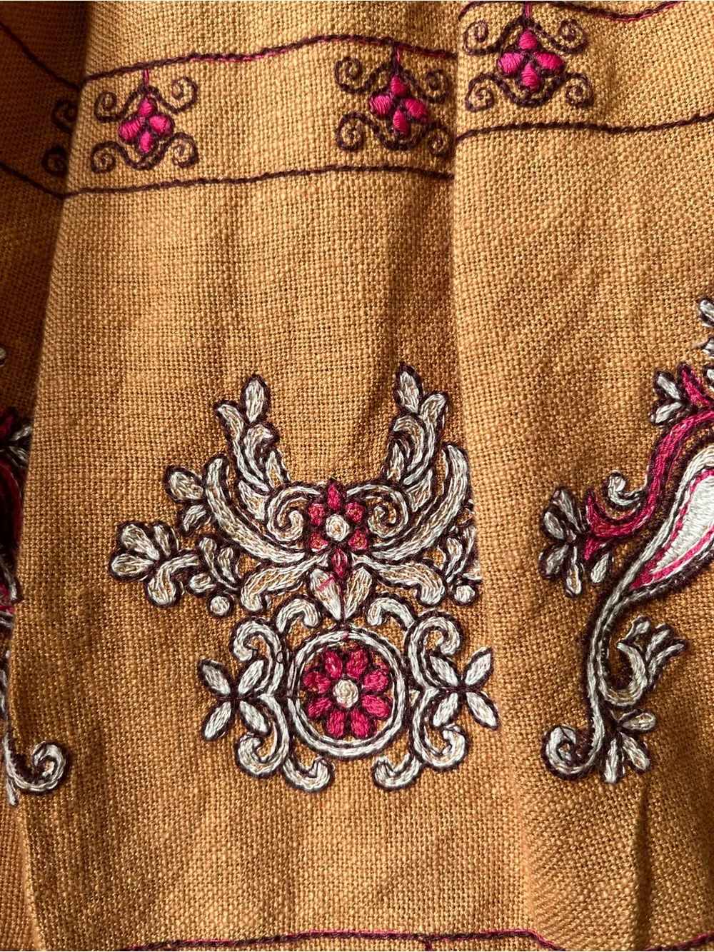 Anthropologie Meghan terracotta embroidered folkloric mini wrap skirt. Size 0